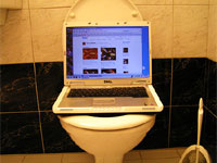 laptop on toilet seat
