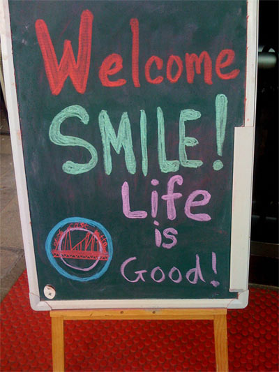 Coffee shop welcome sign - great, subtle marketing effort! small business marketing