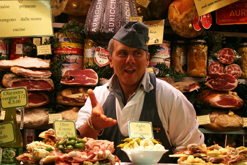 A butcher selling his products
