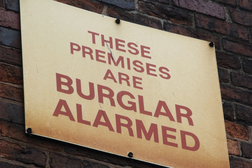 Burglar alarm sign