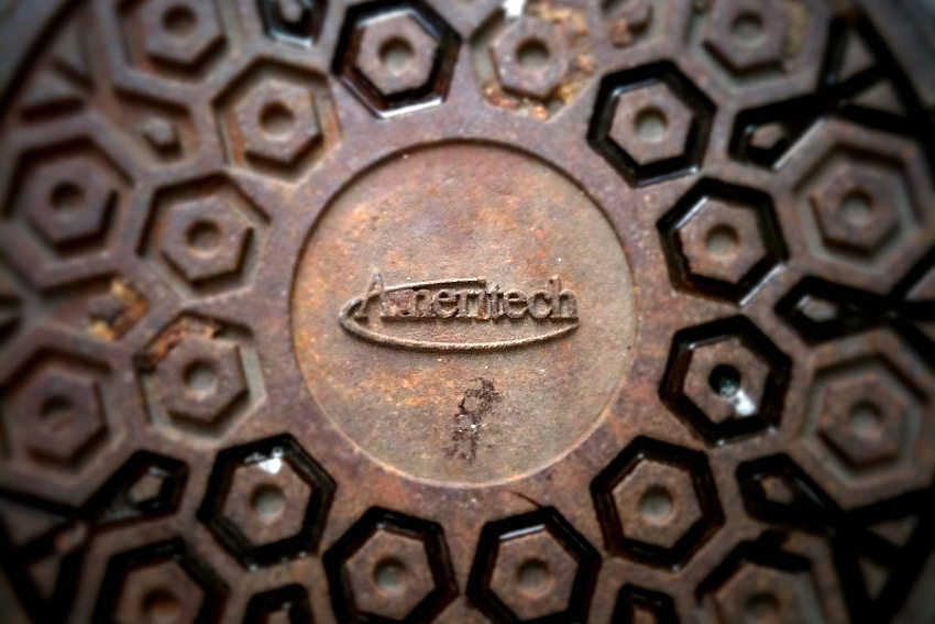 Ameritech logo on a manhole