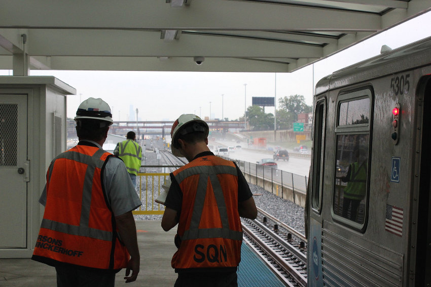 Railway employees are testing the train and the tracks