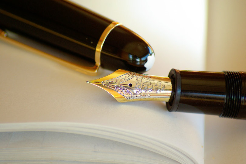 Gold fountain pen as a premium promotional item