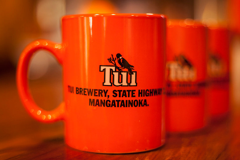 Tui-branded mug
