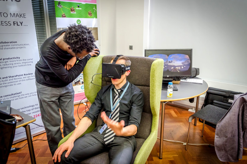 Businessman tries Oculus Rift at digital event
