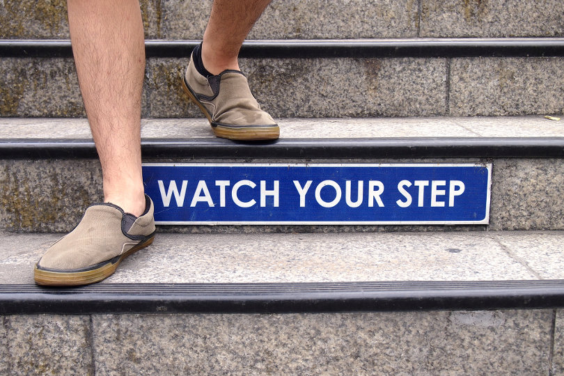 Watch your step sign