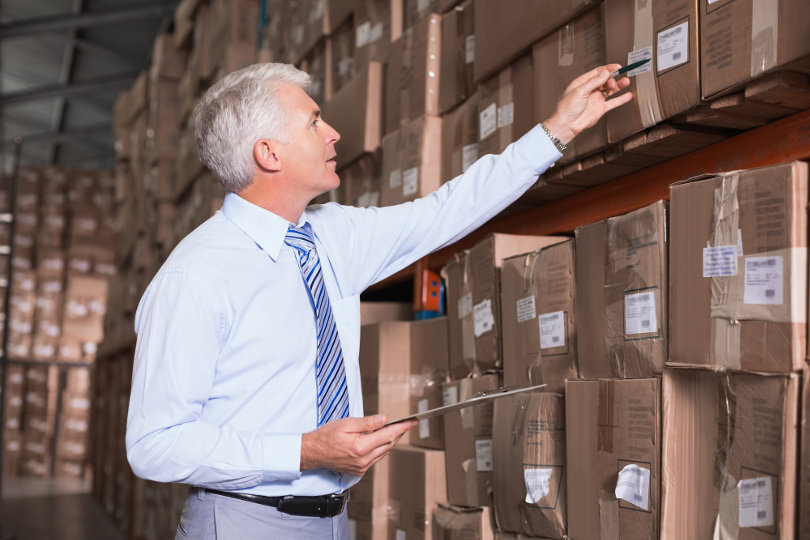 Warehouse manager doing inventory control