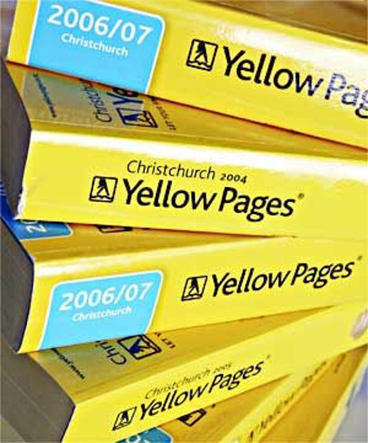 A stack of yellow Pages