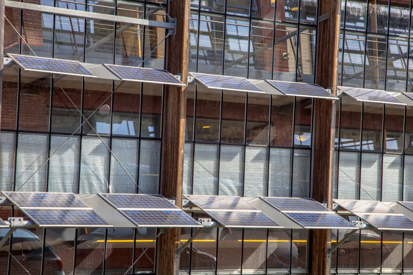 Solar panels in front of an office building