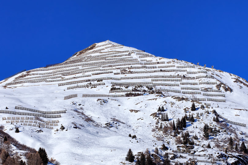 Snow fences on a mountain summit