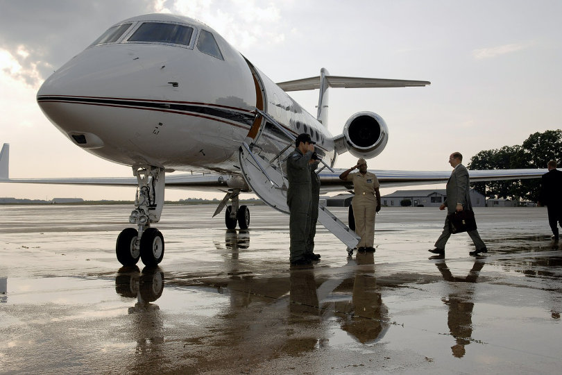 Businessman departing on a private jet